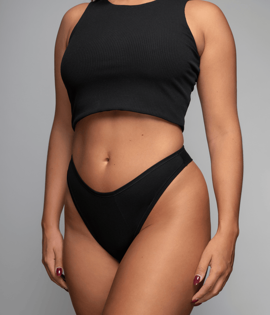 classic thong front photo on model in the color black