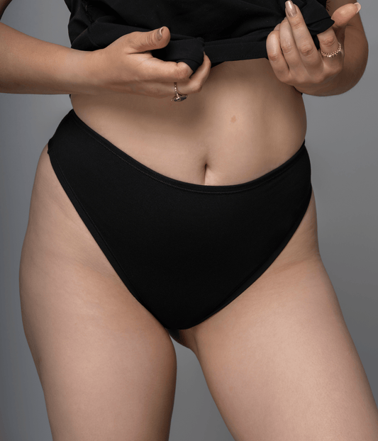 high waist thong front photo on model in the color black